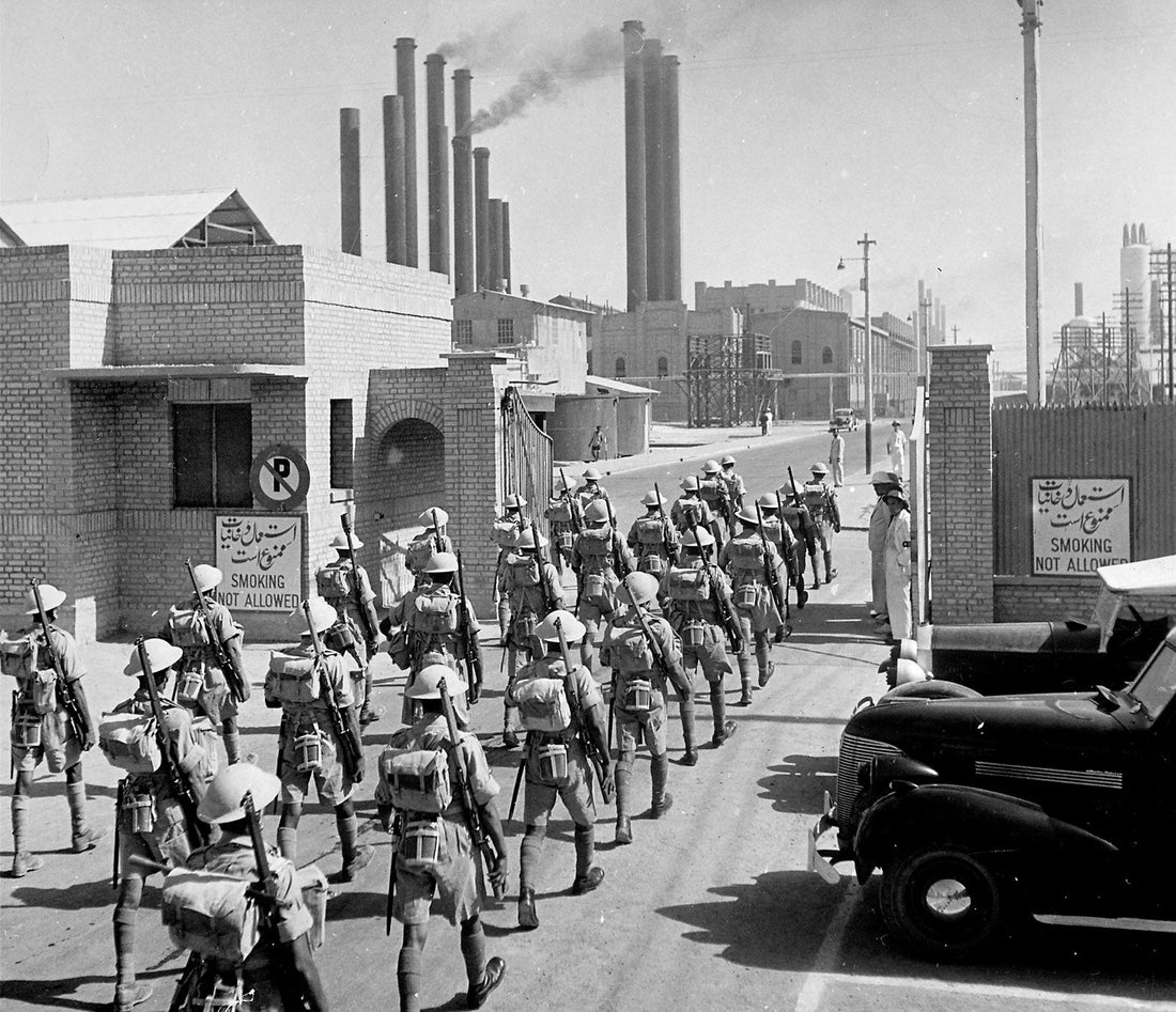 British Indian Army riflemen entering the main gates of Abadan oil refinery in Iran in September 1941