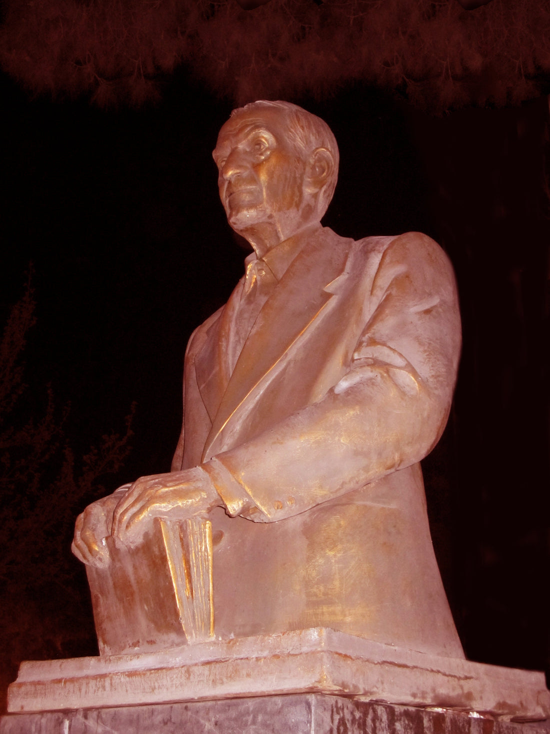 Statue of Iranian poet Shahriar in Tehran at night